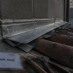 Jonction toit mur avec solin zinc et recouvrement 10 cm anti-infiltrations